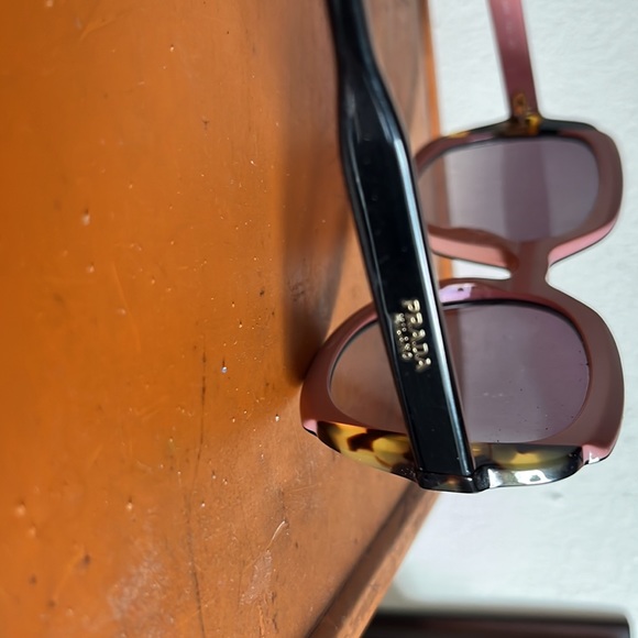 Prada sunglasses. Gently worn. No scratches.comes with case. - Picture 3 of 4